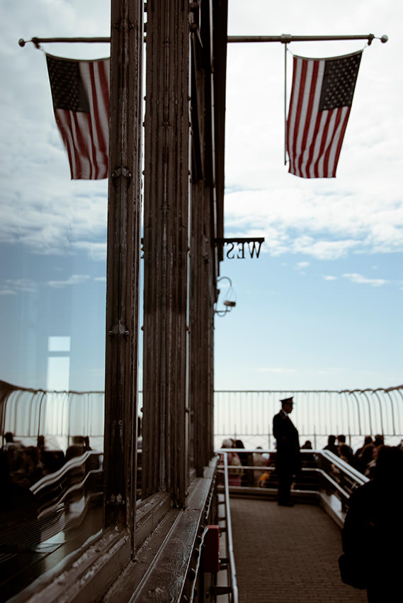 The American flag flies at the top of the Empire State Building