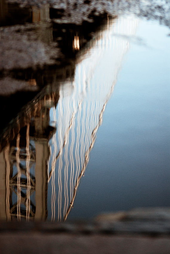 Reflections of the Brooklyn Bridge in Dumbo.