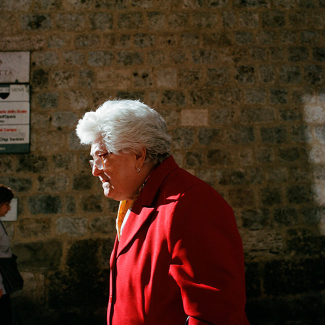 The old lady in the red coat